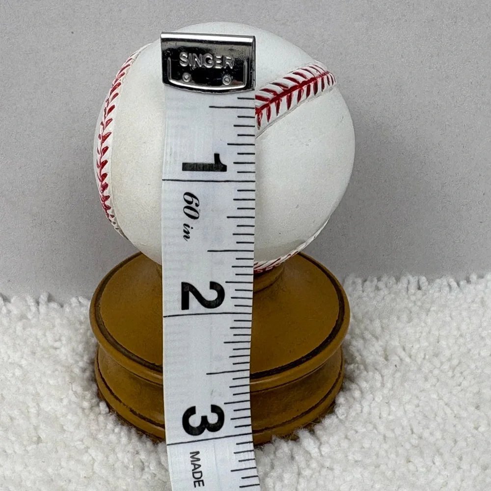Unbranded Small Baseball on a Wooden Display. Used for Decorative Purpose Only.